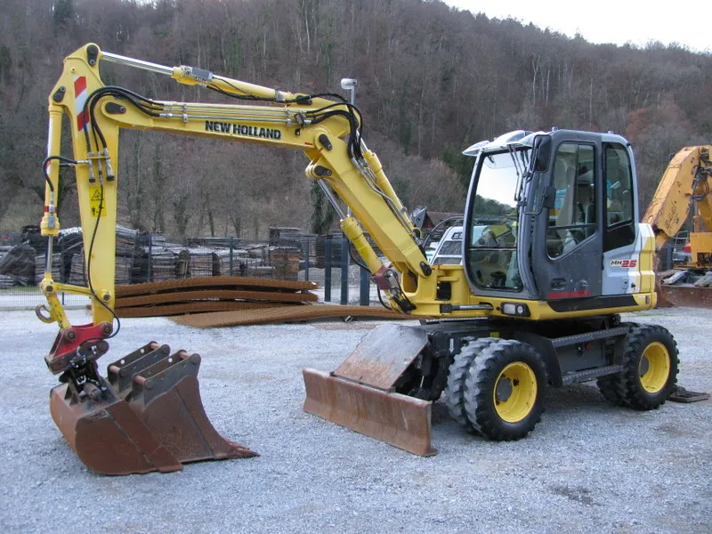 Bager točkaš New Holland MH2,6 sa 3 kašike