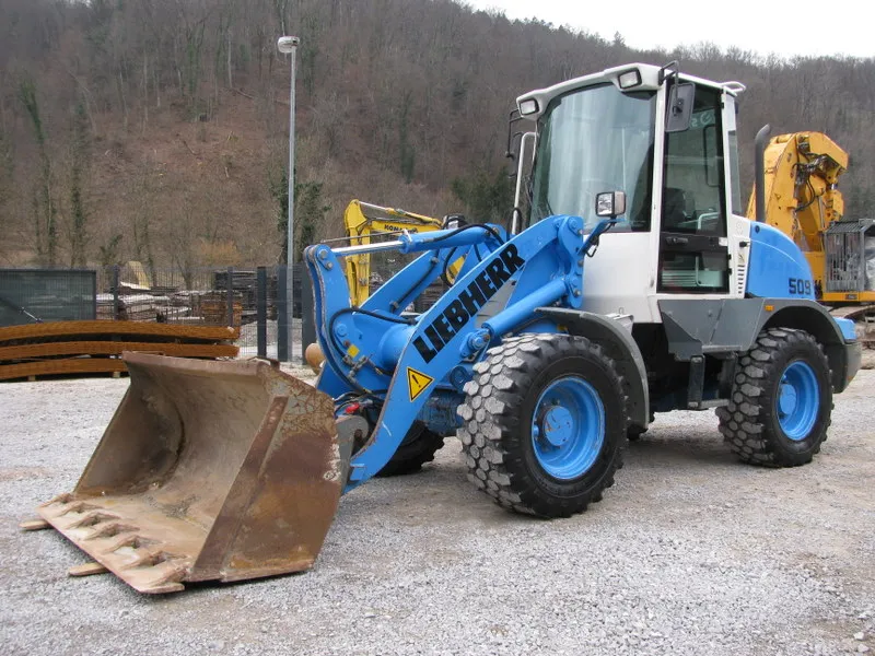 Utovarivač Liebherr L509 sa kašiku + vile